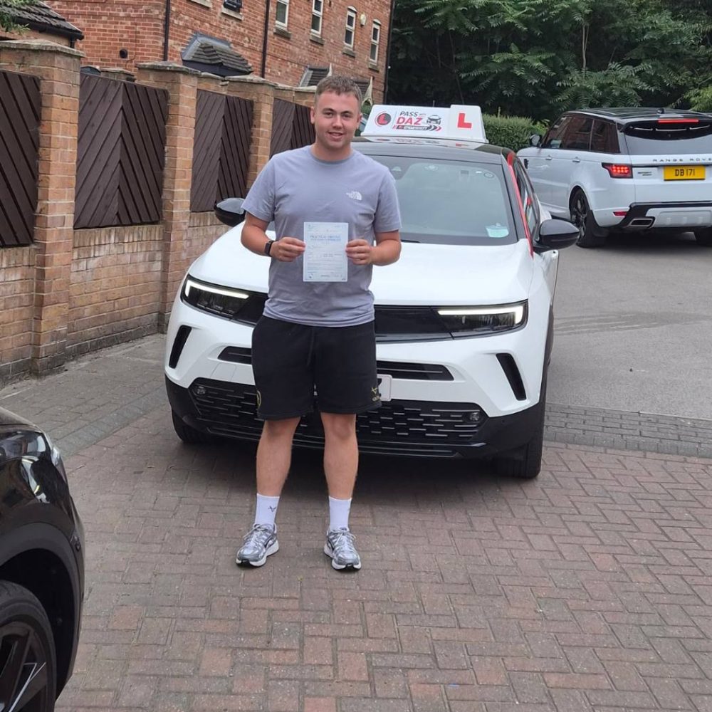 Pupil celebrating passing their driving test with Pass with Daz in Barnsley